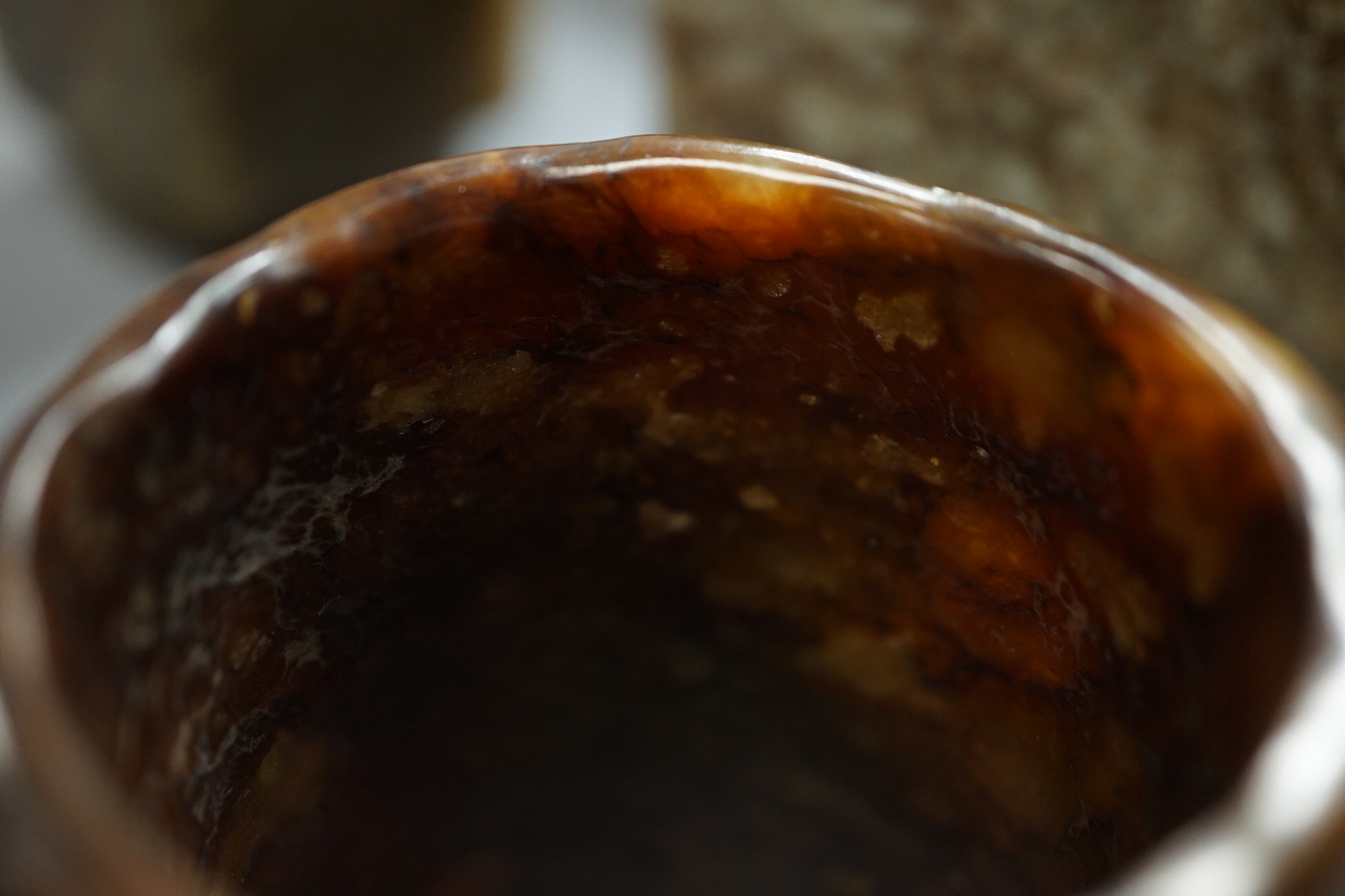 Four Chinese archaistic jade or hardstone cong